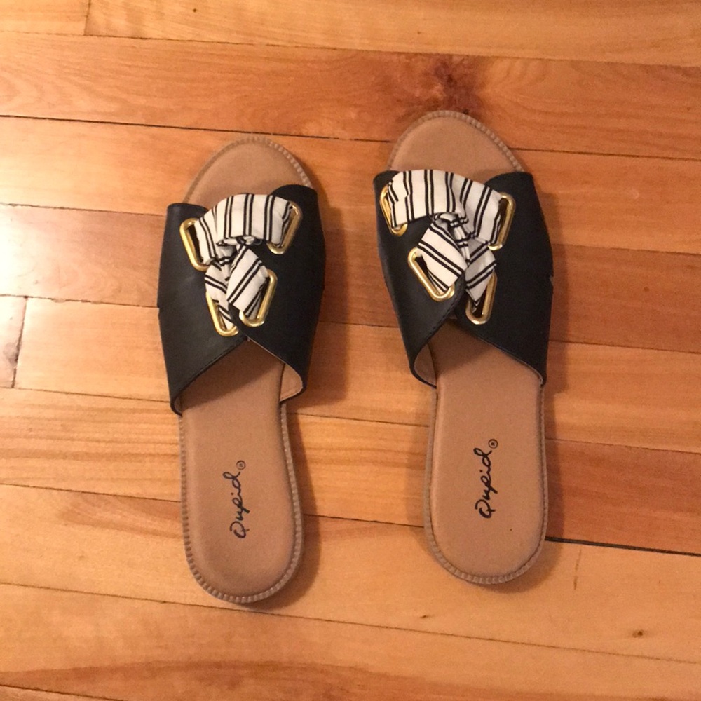 Black and white sandals.